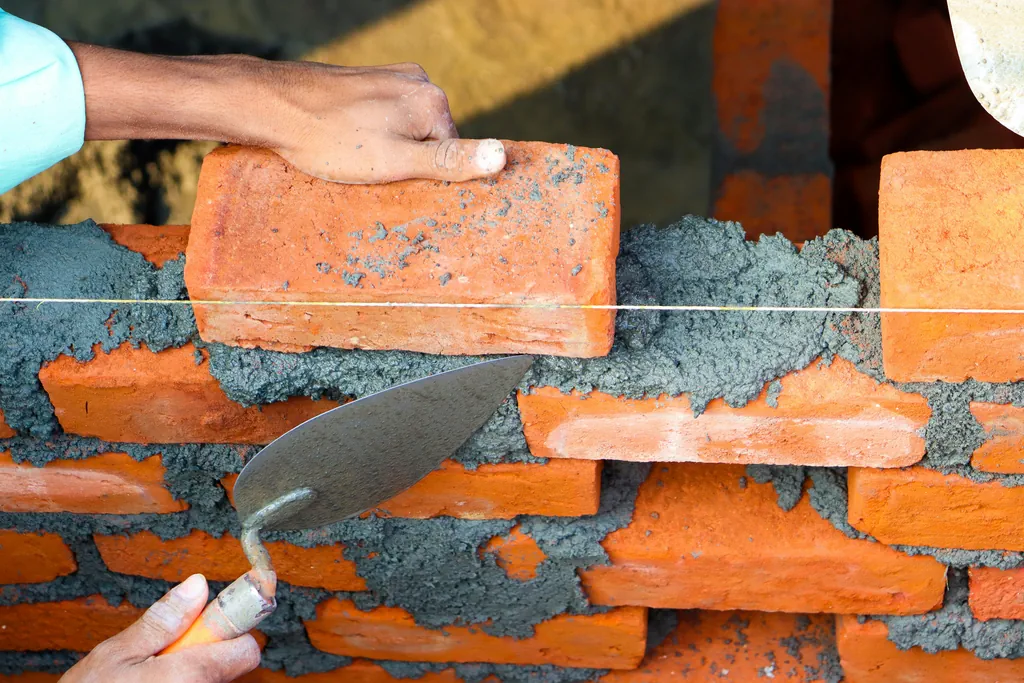 Bricklayer on construction site